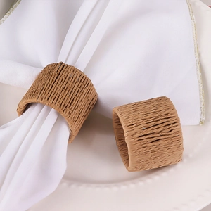 Handwoven natural seagrass napkin rings set for elegant dining table setting decoration