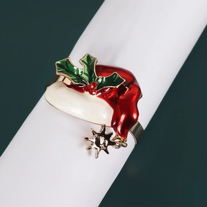 Christmas hat napkin ring with holly leaf detail and star charm for festive table decor
