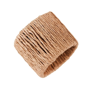 Handmade straw woven napkin ring with natural raffia texture for elegant table decor