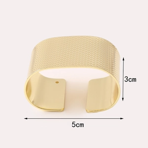 Modern wide matte gold C-shaped metal napkin ring with textured finish 3cm width