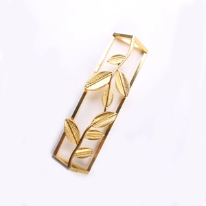 Elegant gold ginkgo leaf napkin ring with rectangle frame for luxury table setting