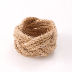 Handmade brown braided hemp rope napkin ring with a rustic farmhouse decorative design