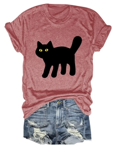 Flat lay of women casual cotton t-shirt with cat print and distressed denim shorts