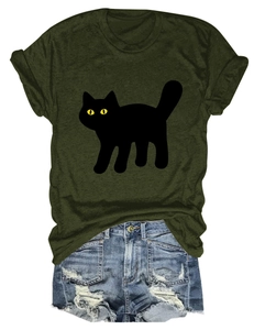 Detail of a casual olive green t-shirt featuring a black cartoon cat with yellow eyes
