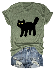 Flat lay of an army green short sleeve cat print T-shirt with distressed denim shorts