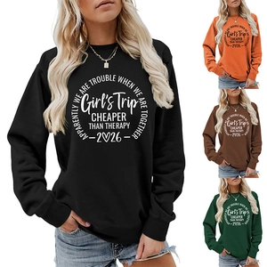 Detail showing high-quality stitching and printed slogan on colorful women sweatshirts