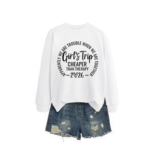 White Girl's Trip sweatshirt paired with distressed blue denim shorts on white background