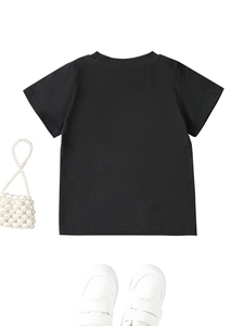 Flat lay view of a black short-sleeved cotton T-shirt for children with round neckline