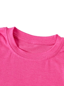 Detail of rose pink kids T-shirt featuring ribbed crew neck and fine double-needle stitching