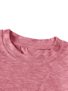 Detailed view of pink kids T-shirt collar with fine knit texture and neat stitching