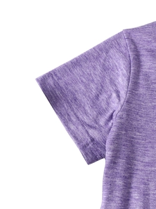 Detail of double-needle stitching on the sleeve and shoulder of heathered purple t-shirt