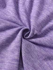 Close-up of soft heather purple knitted fabric texture and premium cotton material