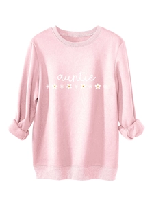 Détail du sweat rose auntie marguerite montrant la texture douce du coton