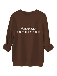 Détails à plat du sweat-shirt marron auntie avec imprimé marguerites et bords-côtes