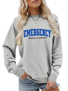 Detail of grey crewneck sweatshirt featuring Emergency Medical Technician print on chest