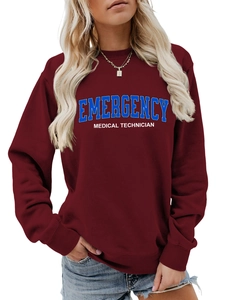 Detail of burgundy sweatshirt showing the blue Emergency Medical Technician print and cuffs