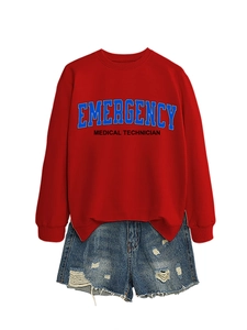 Detail showing red emergency medical technician sweatshirt with distressed denim shorts