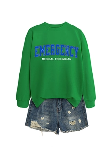 Detail of lime green EMT sweatshirt with emergency medical technician print and ribbed cuffs