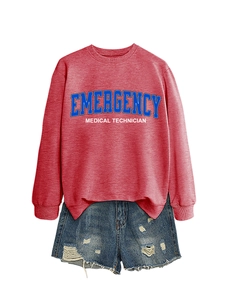 Macro detail of red emergency medical technician sweatshirt and ripped denim shorts set