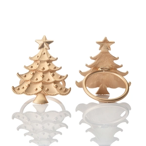 Matte gold metal Christmas tree napkin rings showing front and back views for table decor