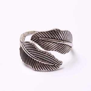 Macro shot of vintage silver leaf ring with detailed veins and oxidized antique finish