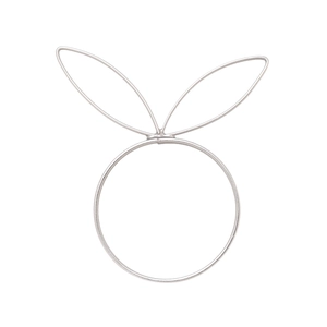 Polished silver metal rabbit ear napkin ring showing symmetrical minimalist wire design