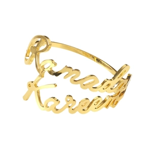Golden Ramadan Kareem metal napkin ring with hollow script for festive table decor