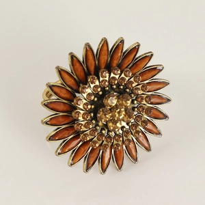 Detail of amber sunflower napkin ring with vintage gold finish and sparkling rhinestones