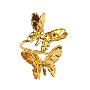 Elegant gold butterfly napkin ring featuring detailed filigree and polished iron finish