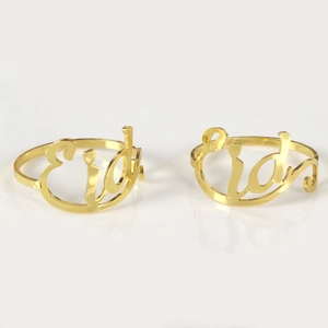 Macro detail of golden metal Eid napkin ring with reflective finish for festive table decor