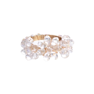 Golden woven napkin ring with sparkling crystal beads for elegant table decoration