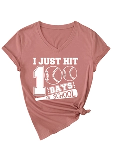 Close-up of rust pink V-neck T-shirt with 100 Days of School baseball graphic print