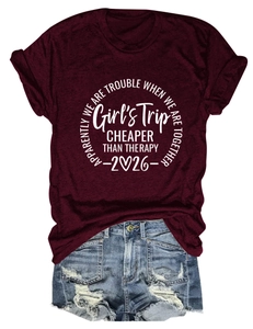 Burgundy t-shirt with Girls Trip print paired with distressed denim shorts