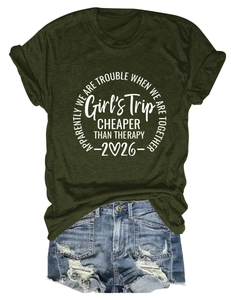 Close-up of Girls Trip green t-shirt with rolled sleeves and ripped denim shorts set
