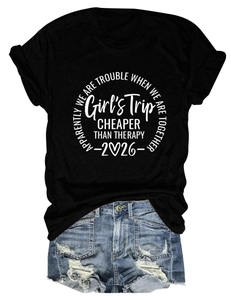 Detailed view of the 'Girl's Trip' printed black T-shirt with frayed denim shorts set
