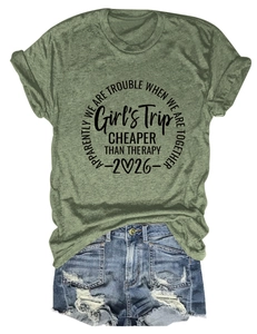 Flat lay detail of army green crewneck T-shirt and distressed denim shorts casual set