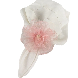 Pink mesh organza flower napkin ring with cream stamens on white cloth napkin