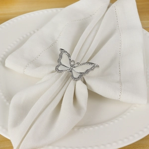 Elegant butterfly napkin ring with white enamel and sparkling rhinestones for table decor