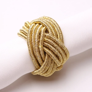 Handmade gold braided knot napkin ring for elegant hotel table setting and restaurant decor