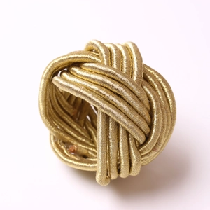 Handmade gold braided knot napkin ring for elegant home table decoration setting