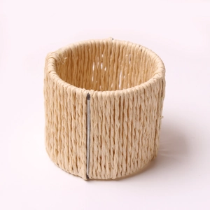 Handcrafted woven napkin ring made from natural seagrass for elegant table settings