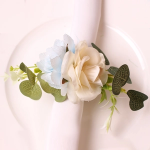 Handmade cream rose and blue flower napkin ring with eucalyptus leaves for table decor