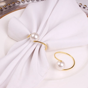 Elegant gold pearl napkin rings set for creative Valentine table setting decoration
