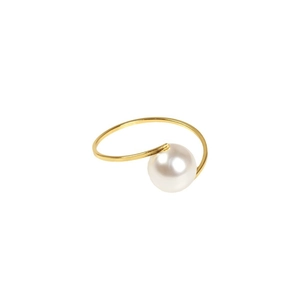 Elegant gold metal napkin ring with a large white pearl for festive table decoration