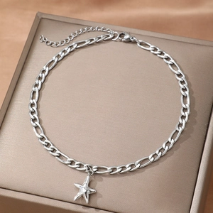 Punk style stainless steel star anklet with Figaro chain shown from a 45-degree angle