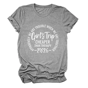 Detail of Girl's Trip print on soft heather grey cotton t-shirt with rolled sleeves