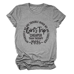 Close-up of grey cotton T-shirt featuring Girl's Trip 2026 black circular print