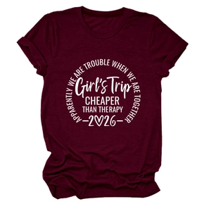 Detail of Girls Trip print on a burgundy crew neck cotton T-shirt with folded sleeves