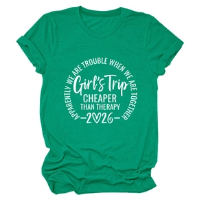 Close-up of green round neck T-shirt featuring white Girls Trip circle print design
