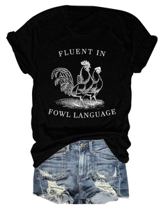 Detail of Fluent In Fowl Language black t-shirt print paired with ripped denim shorts